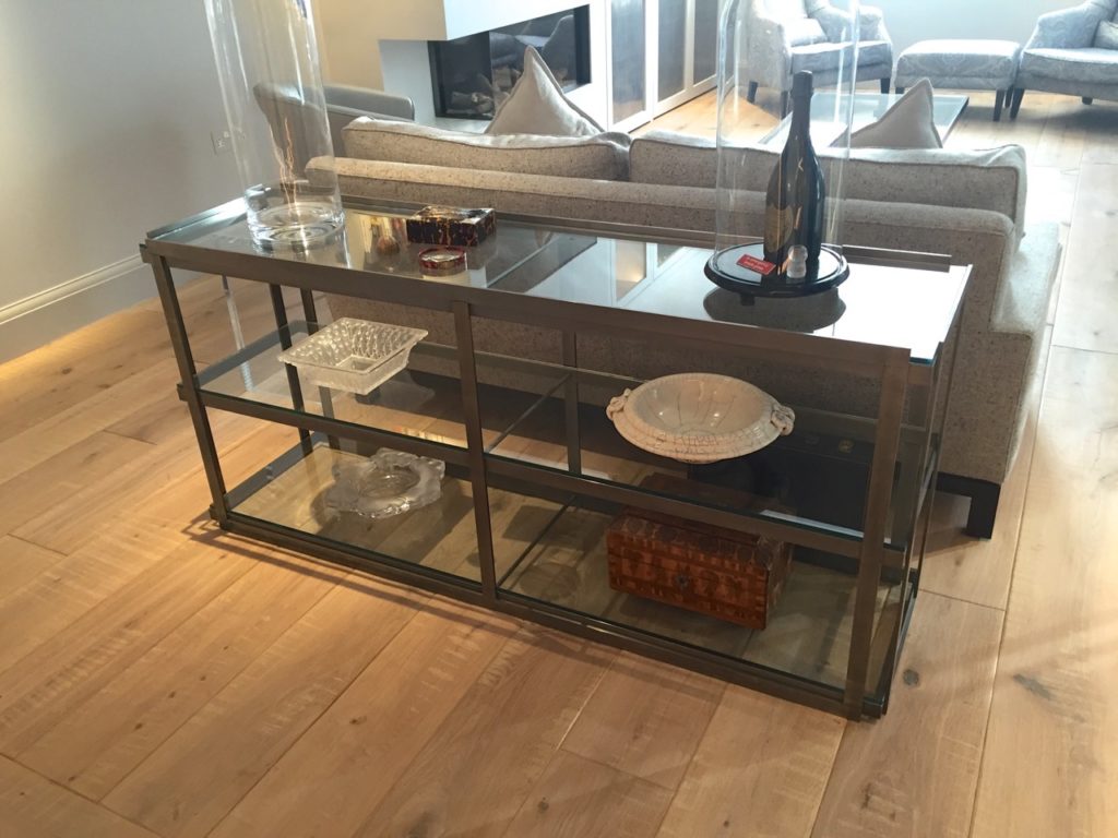 Custom made steel and glass console shelving unit