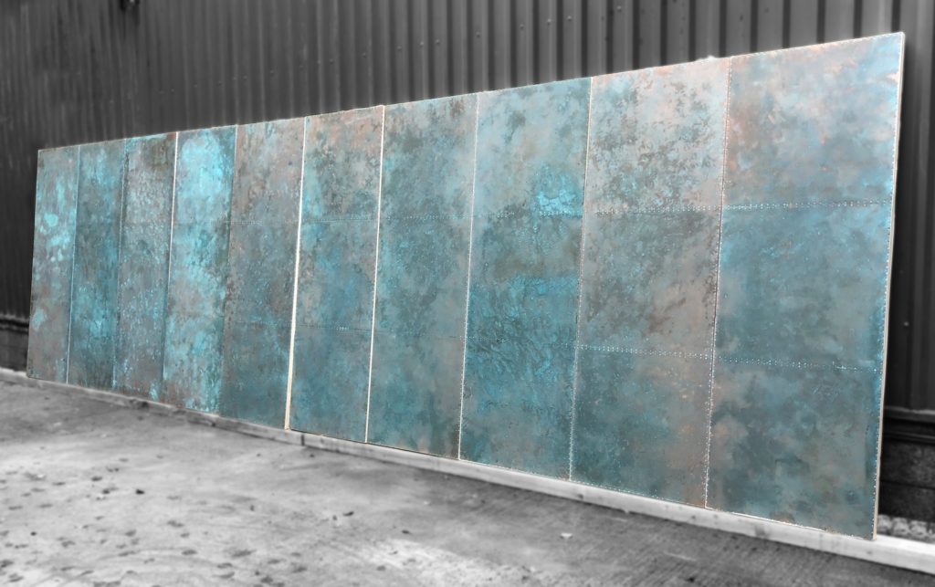 Bespoke copper clad doors with verdigris patinated finish