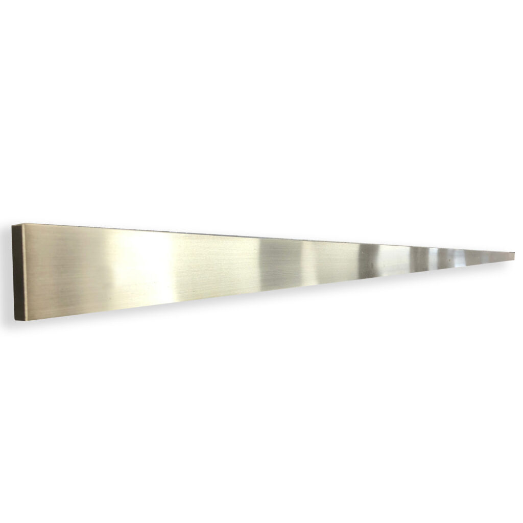 A long, triangular wall sculpture featuring a metallic brushed finish that evokes the aesthetic of a brass Sliding Door and Panel Track, gradually narrowing from a wide left side to a narrower right side, displayed against a plain white background.