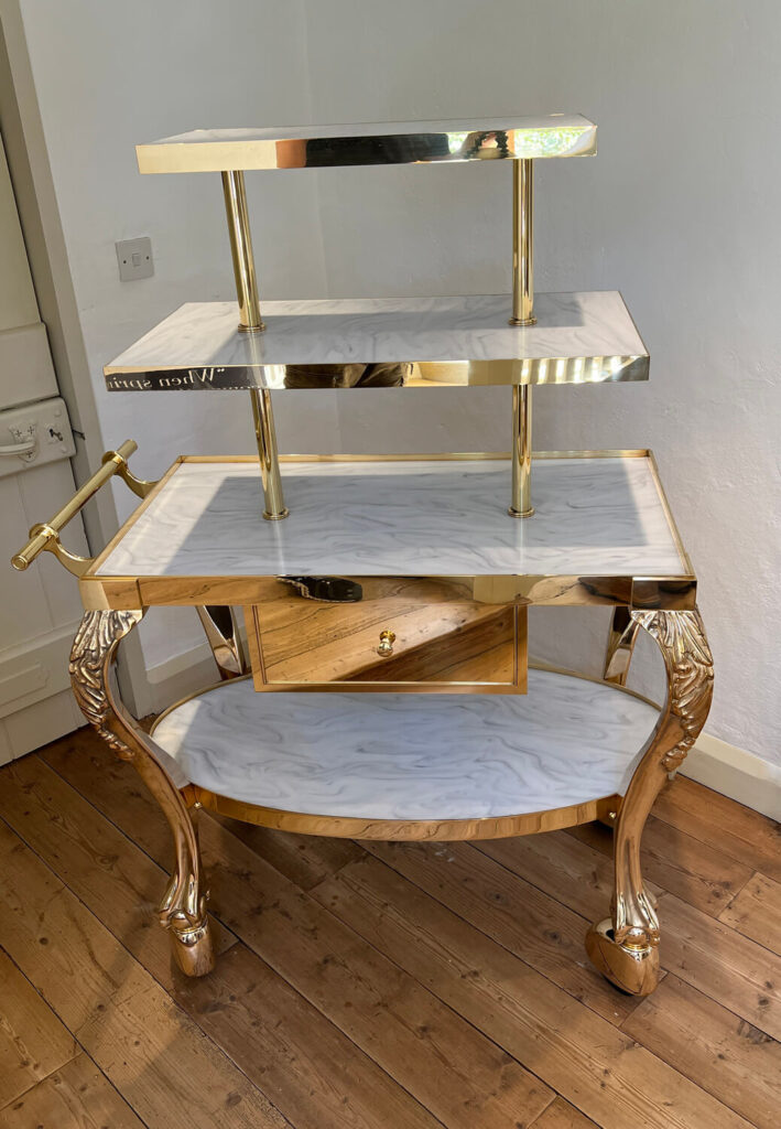 Tiered bespoke brass serving trolley