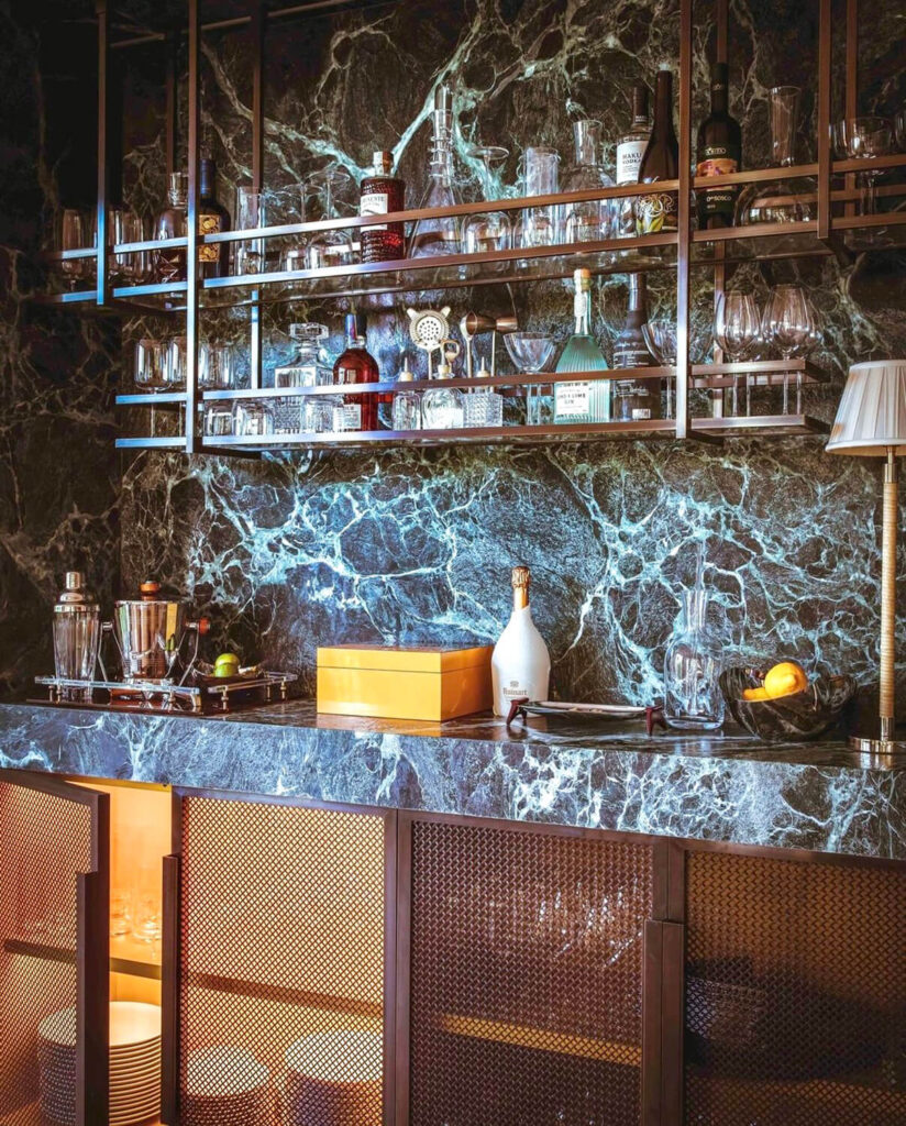 Bar shelving custom made from brass and glass